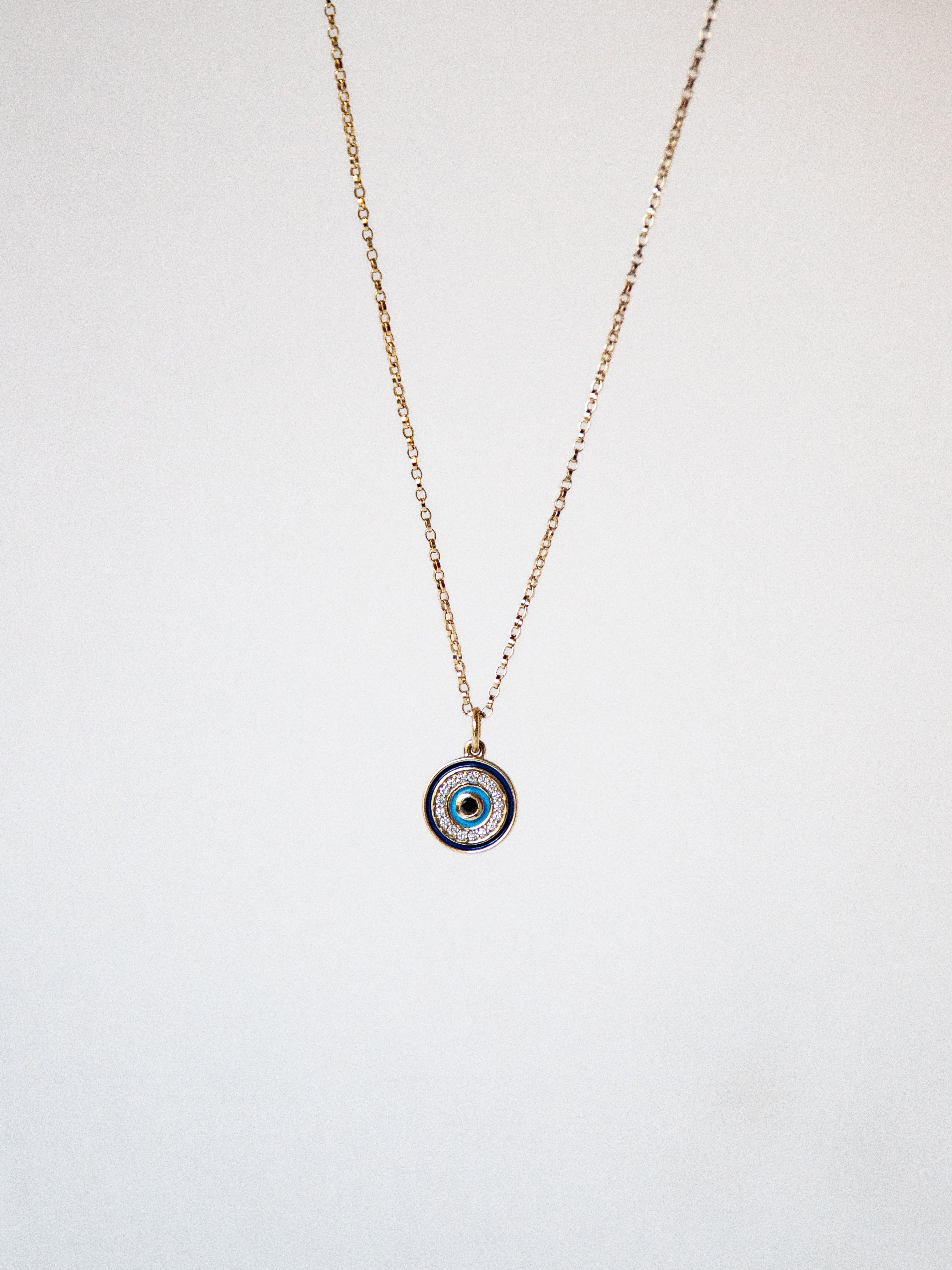 Diamond and Gold Evil Eye Pendant