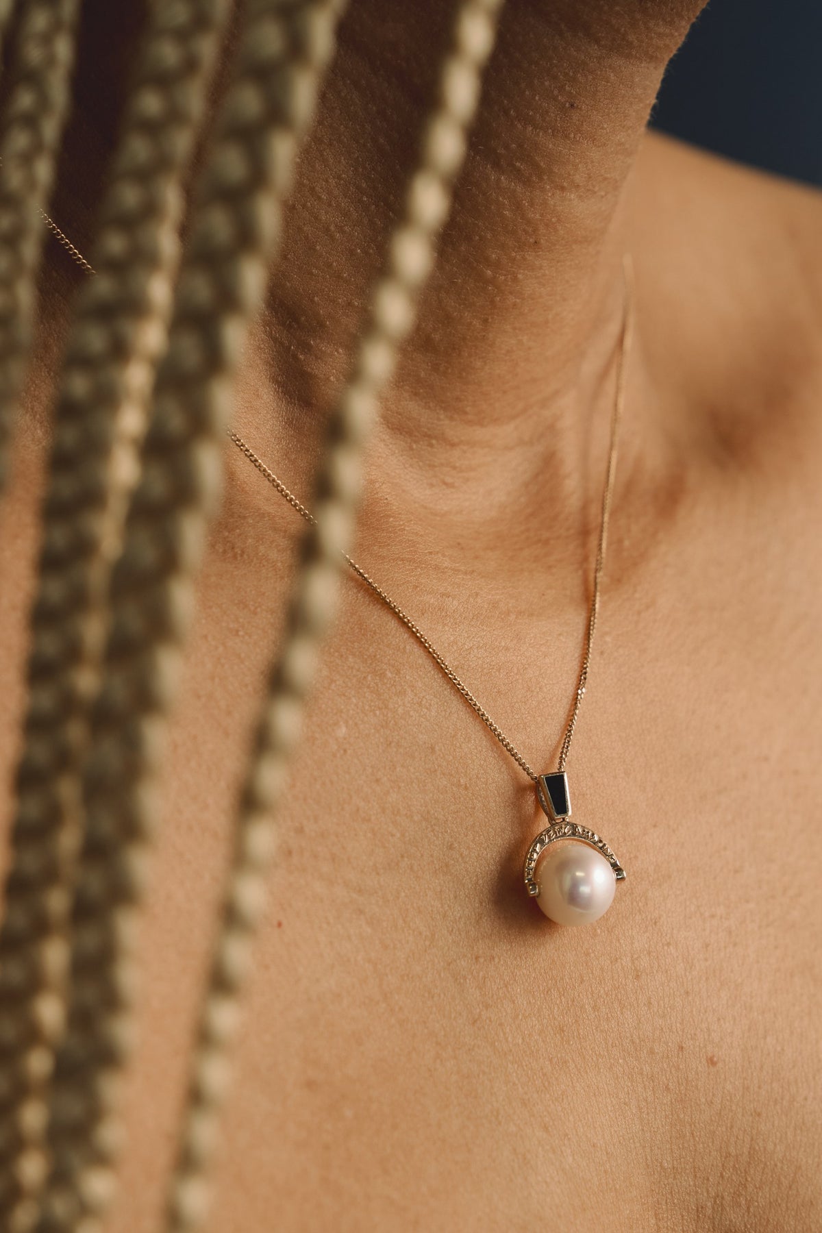 Keep Being Amazing™ Pendant worn on the neck