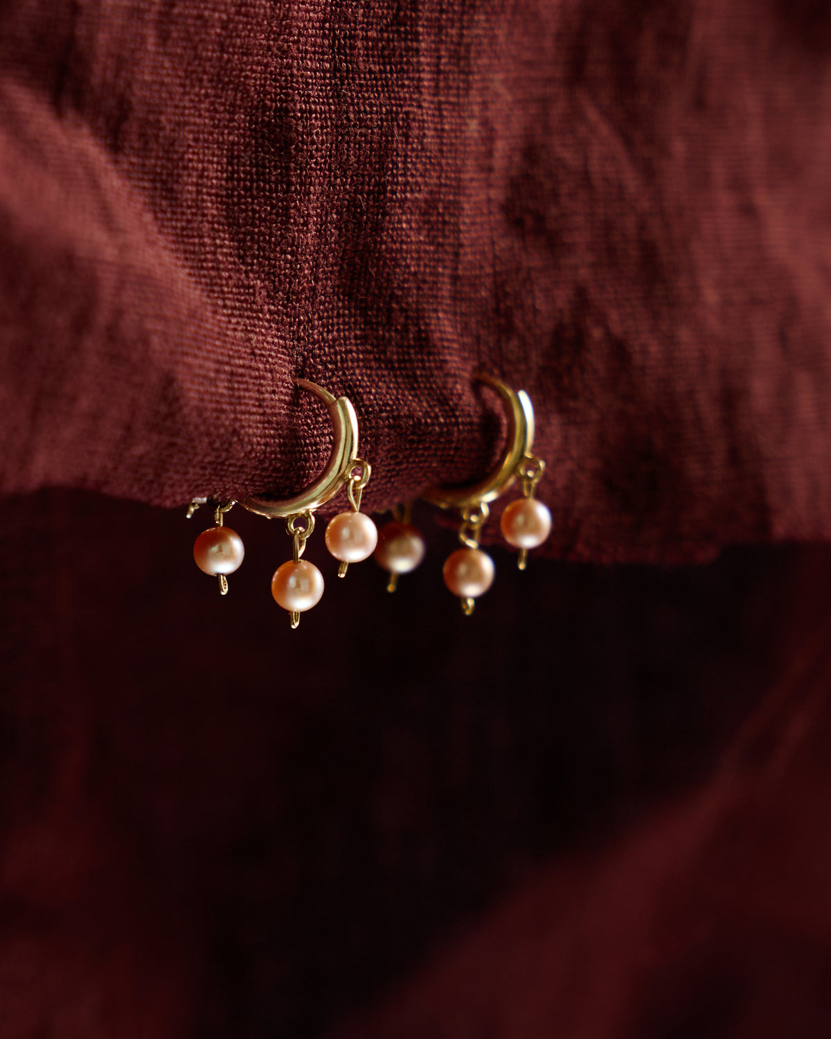 Malar Jhumka Hoops side view: pink pearl drops on 14k gold huggie hoops