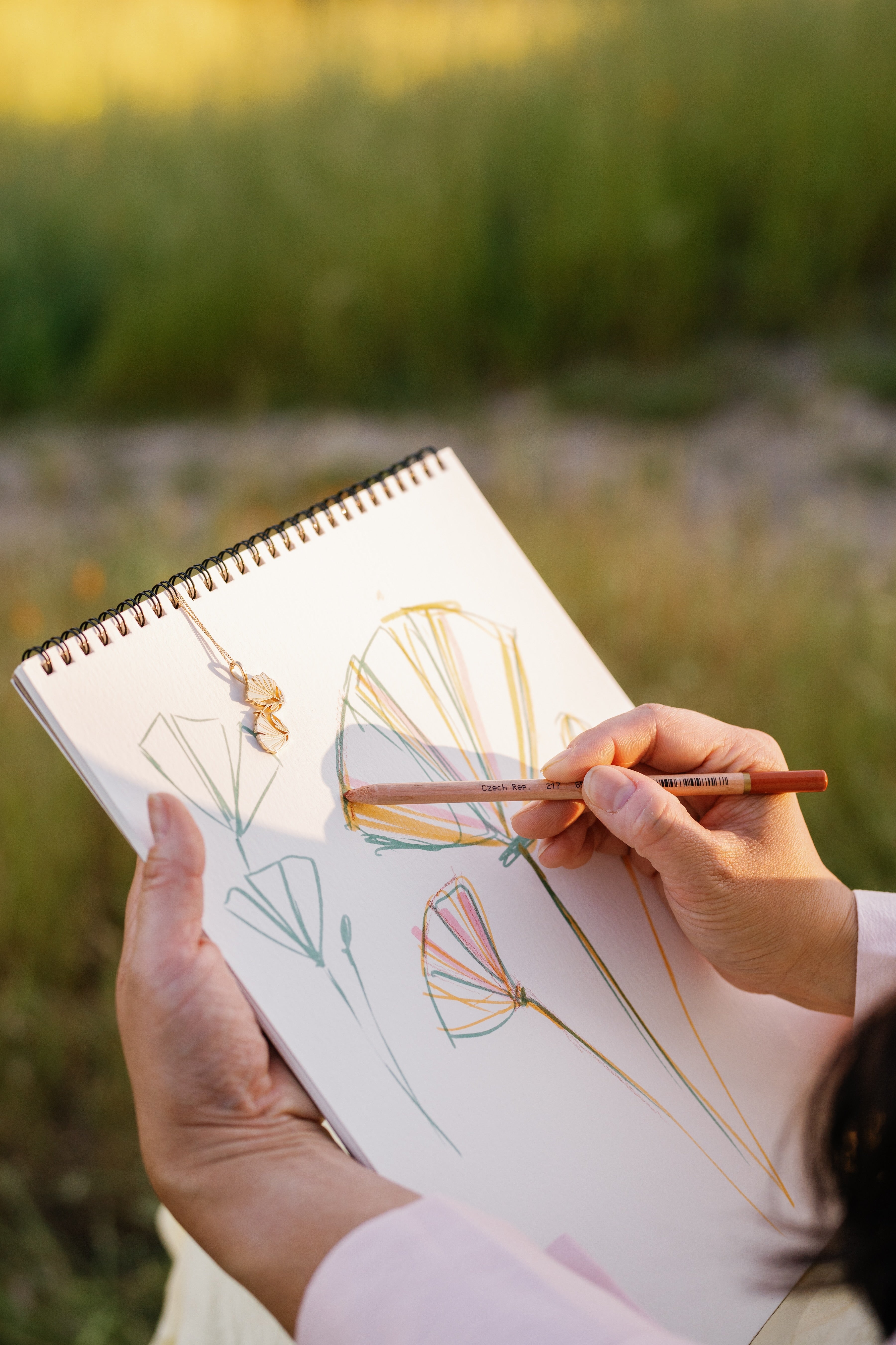 The Flora Sagrada Collection invites you to carry a piece of art that connects you to nature, family, and self.