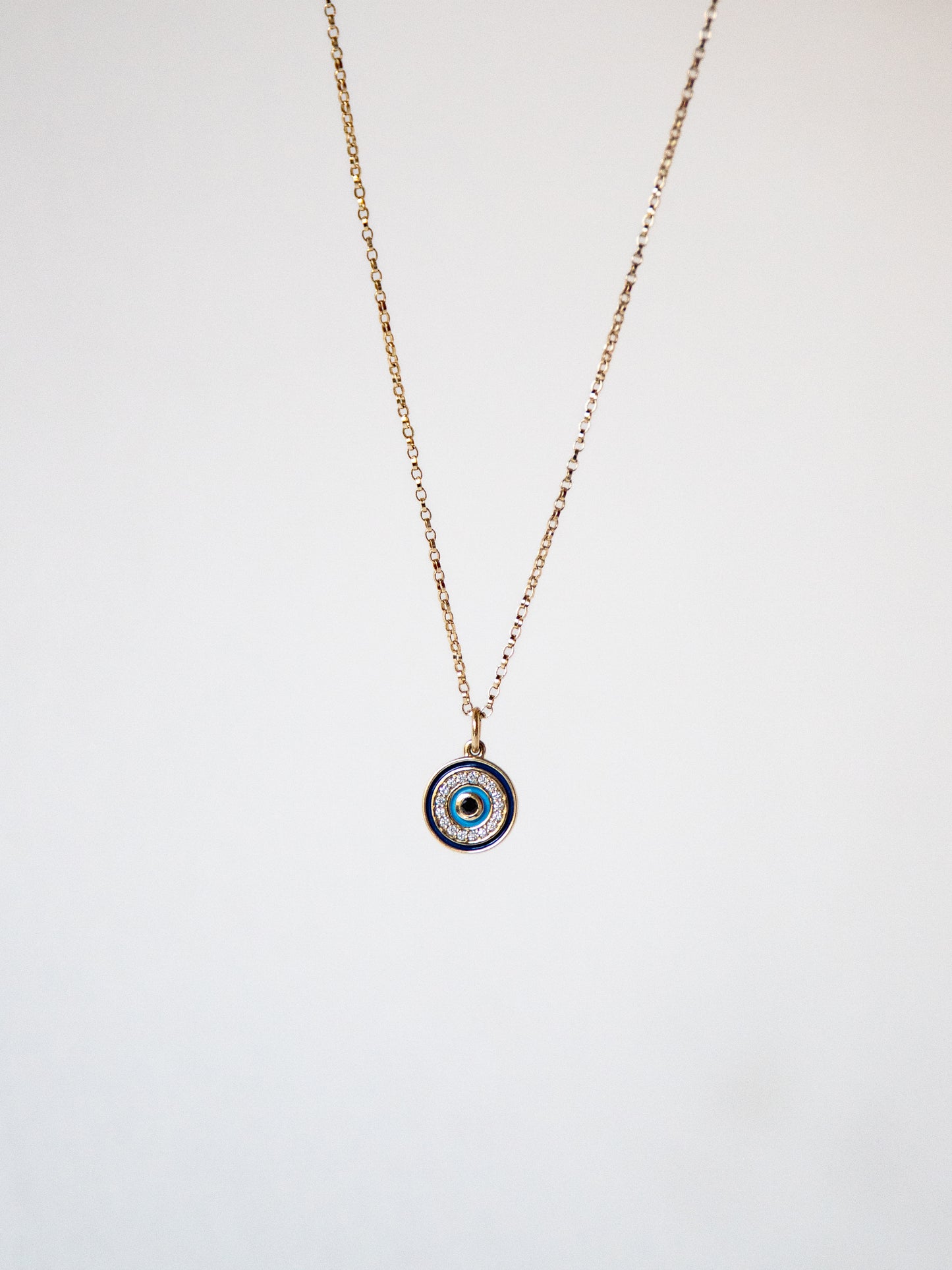 Diamond and Gold Evil Eye Pendant